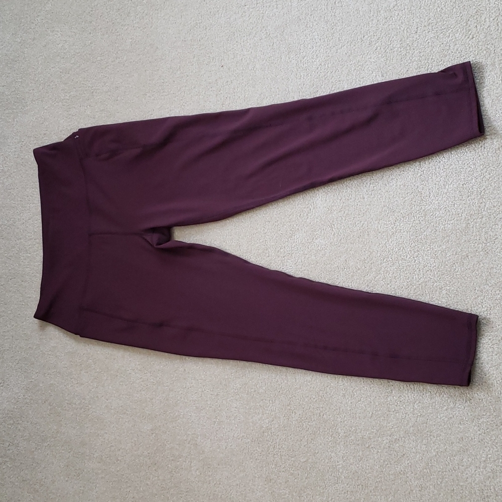 EUC SPYDER Full Length Leggings with Side Pockets. Color is Cabernet. Size L.